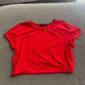 Red cropped top with a relaxed fit